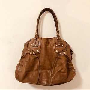 Used Juicy Couture worn leather shoulder bag